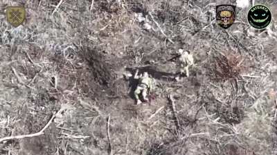 A Russian soldier finishes off his wounded comra<wbr>de-in<wbr>-arms with shots to the head in the Bakhmut direction
