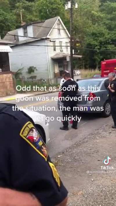 Woman sees a black man surrounded by cops so she decides to record. The cops don’t like that.