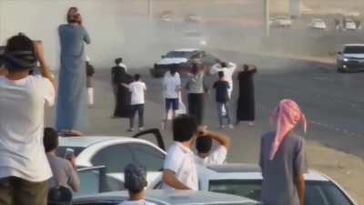 Parked vehicle saves spectators from out of control drifter