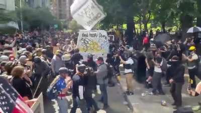 Overhead view of huge fight breaking out between Proud Boys and Antifa in front of Justice Center in Portland