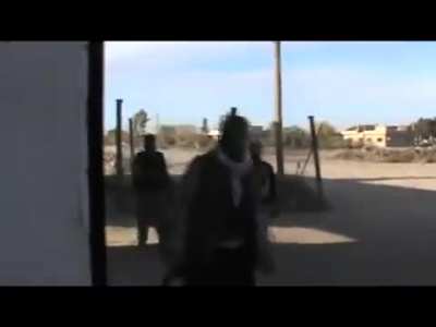 Incoming shell nearly finds a group of Opposition fighters during the siege of Deir ez-Zor Airport - 2012