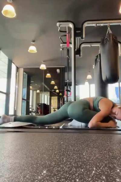 Stretching in tight leggings