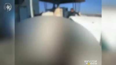Body-cam of an Israeli police officer preforming routine check on a car at a check point, reacting to an attack by 4 palastinian gunman