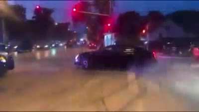 Low IQ dotard does donuts around cop car