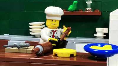 A Lego Chef makes a Pizza