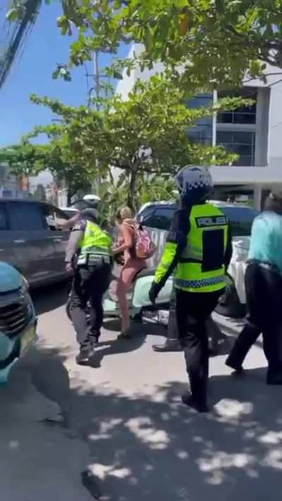 Tourist in Bali refuses to wear a helmet