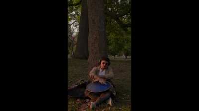 Playing a very satisfying melody on my handpan while enjoying the autumn sunset