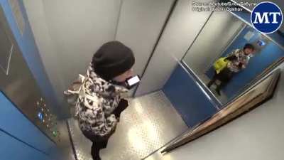 Russian prankster hangs a portrait of Vladimir Putin in an elevator and films the reactions of residents