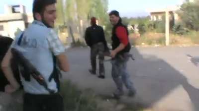 Early-war FSA fighters messing around with a fake 