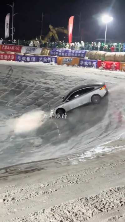 Driver skillfully drifts EV on ice in 