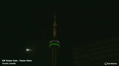 This morning, a small asteroid, which had been discovered only hours earlier, struck Earth's atmosphere and completely disintegrated in a bright (between Mag -10 and -20) fireball over Canada. (Credit: CN Tower Cam, Scott Sutherland, SpaceWeather.com)