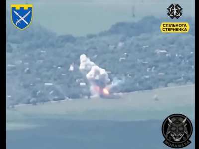 A Russian 2S19 Msta-S 152mm self-propelled howitzer is destroyed after being hit by a Ukrainian FPV drone while on the move somewhere on the Avdiivka front