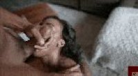 Covering her beautiful face with a huge facial