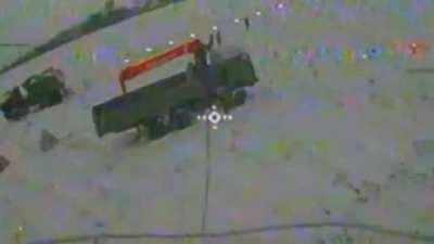 Russian truck with a manipulator attacked by a FPV drone from the 117th Separate Territorial Defense Brigade (AFU). Near the village of Dronivka, Belgorod Region. 27/Jan/2024.