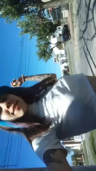 Walking in the streets, without bra ;)