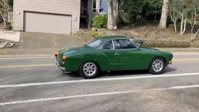 My neighbor has a very cool car.