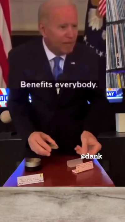 Biden rolling a joint. 