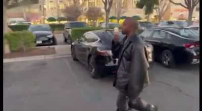 Ye eating ice cream and getting into a mini van today (1-20-2022)