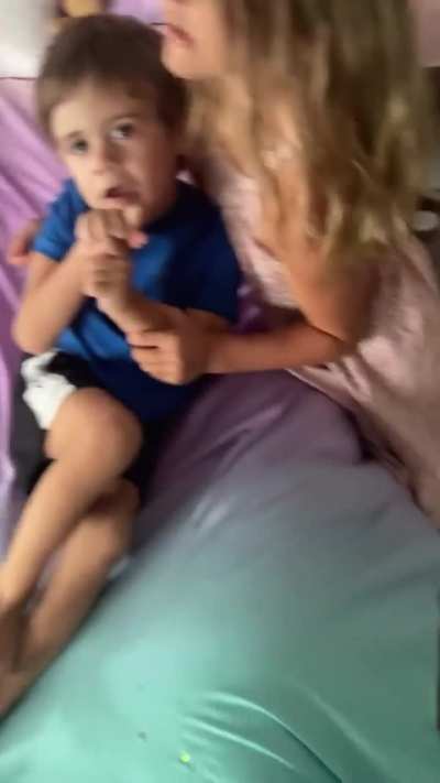 Girl always makes sure to include her disabled little brother.