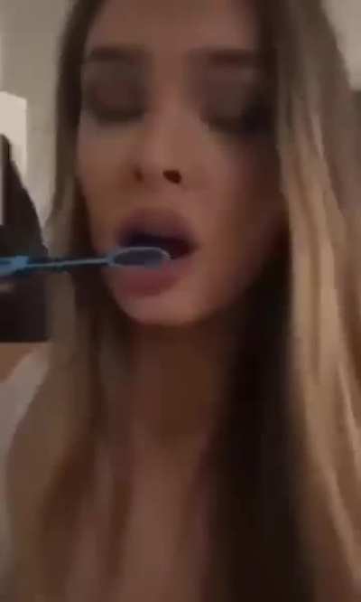 Brushing her teeth