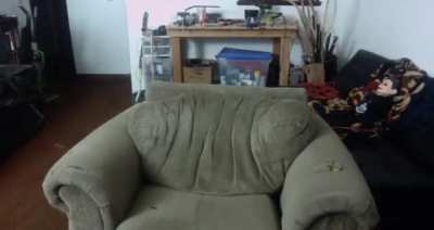 Cobra falls into black hole behind his chair