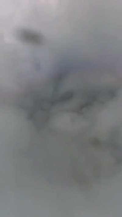 Skydiving into a 14,000 ft thunder cloud.