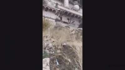 Man is seen jumping for a birthday picture. Proceeds to fall off a cliff