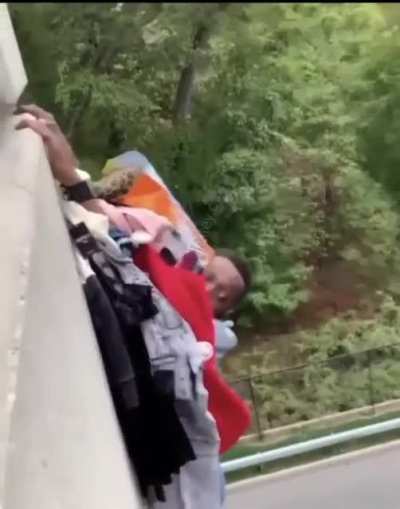 Forever 21 store security chases a thief onto the end of a ledge