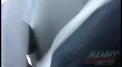 Close call between a motorcycle and a semi..