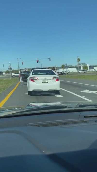 Florida woman shoots at man during fender bender.