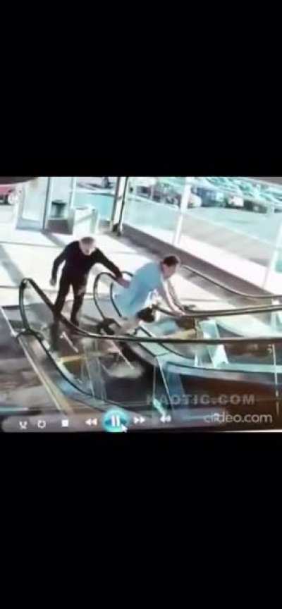 Old lady experiences escalator seemingly for the first time. Fails.