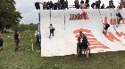 Father helps son overcome obstacle, with the help of strangers.