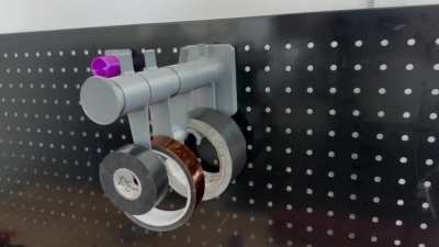 Designed this to hang tape while retaining easy access