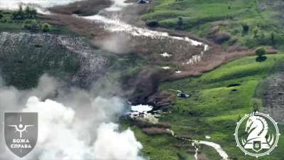 A pair of Army Aviation Mi-24s making a rocket attack on Russian targets in Pokrovsky direction. Filmed by drone of the 47th Mechanized Brigade, June 2024.