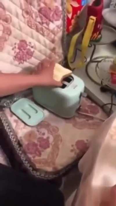 Granny toasting bread