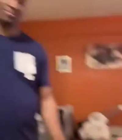 Baby sees his dad in his new haircut