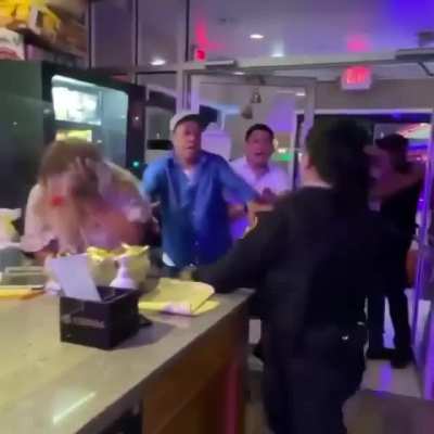 Old lady sucker punch a officer then cries when punched back