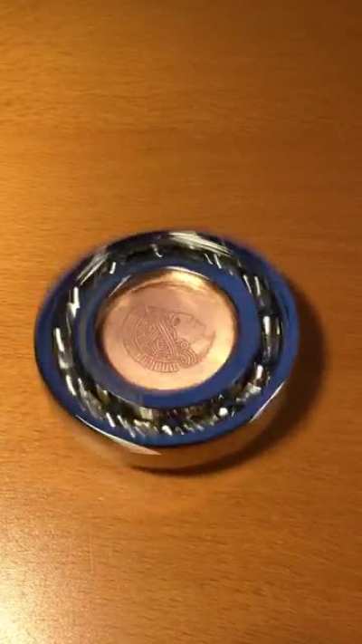 The sound this medal makes just before stopping to spin
