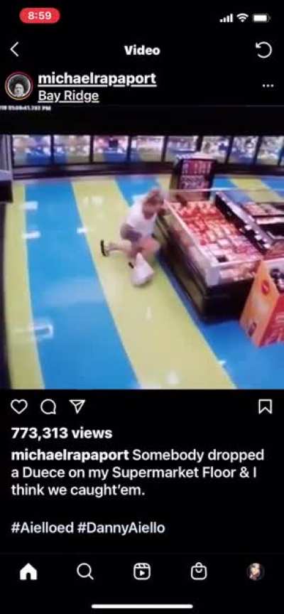 Woman shits on grocery store floor.