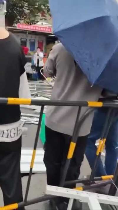 Guangzhou, China the people who are fed up with the quarantine protesting and fighting the COVID police 11/24/2022