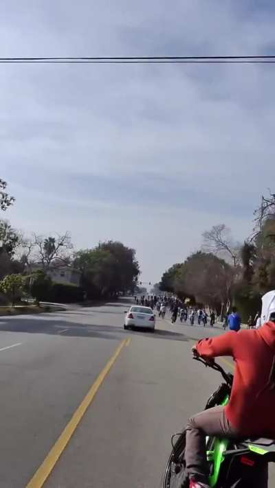 Car driver recklessly trying to get passed moving bikers