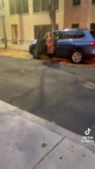 Lady gets mad because she was caught backing up into someone’s car