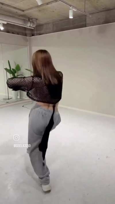 Side topless view of this Asian busty girl, see through clothes