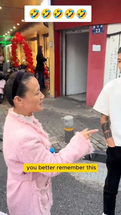 Chinese woman tries to preach about Jesus to Two Young Chinese Men