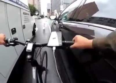 Altercation when a driver parks in a bike lane