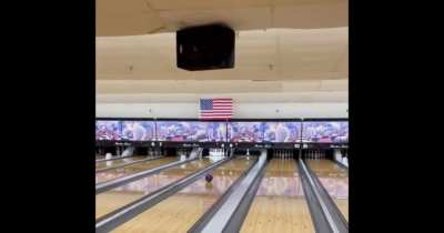 guy pulls of bowling trick