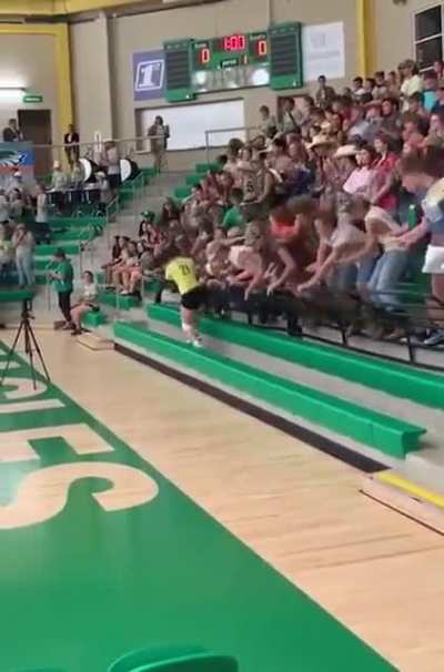 The railing supports didn't support the weight of the supporters at this 2019 volleyball game