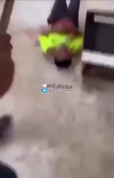 Filipino citizen in Israel getting beaten (to death I assume) by Hamas | NSFL