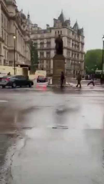 Police horses are loose and knocking over people as they run through the streets of London
