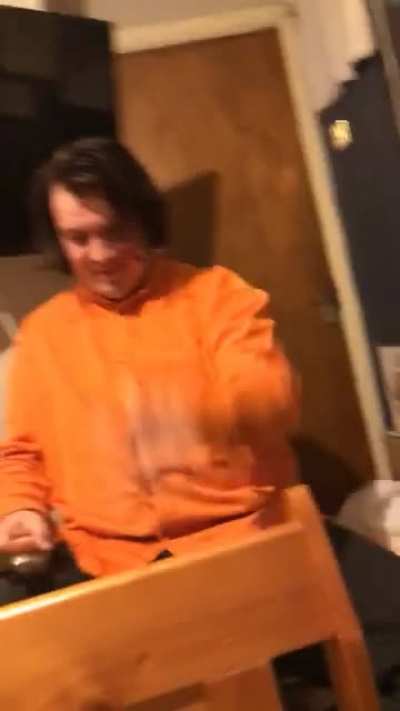 guy hits his finger with a hammer